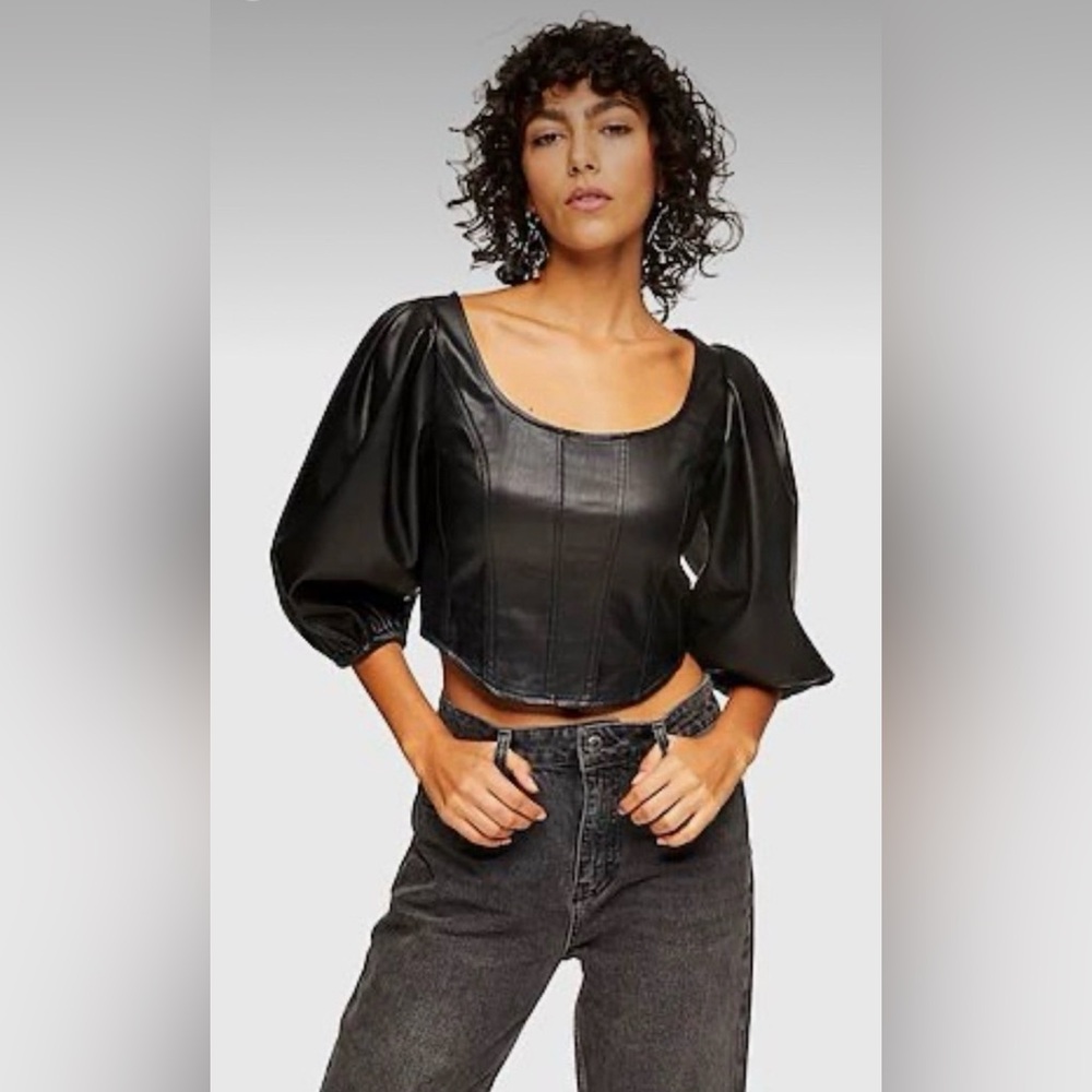 Adorable STERA COLLECTION
Black Puff faux leather puff Sleeve blouse.